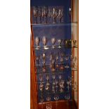 A quantity of wine glasses, champagne flutes and liqueur glasses,