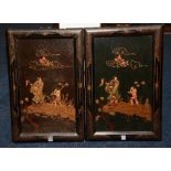 A pair of Oriental hardwood panels, with relief gilt decoration of a father with son in landscape,