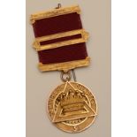 A 9ct gold Masonic St Michael Chapter 31 medal, depicting relief crown within triangle,