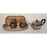 A silver plated teaset, comprising teapot, milk and sugar,