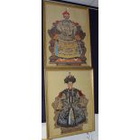 A pair of large Oriental panels on silk, depicting male and female royalty in gilt frames,