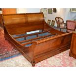 A modern super king sleigh bed by 'And So to Bed',
