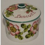 A Wemyss ware biscuit jar and cover, painted with floral pink roses, stamped Wemyss to base,
