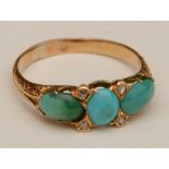 A gold turquoise and diamond ring,