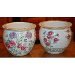 A pair of Cetem Ware pottery jardiniere's, decorated with colourful floral panels on white ground,