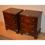 A pair of reproduction three drawer chests of drawers by Bevan & Funnell,