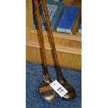 Two vintage hickory shafted golf clubs, both drivers stamped 'Martin & Kirkaldy Special' to end,