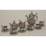 A porcelain six piece coffee set by R Capodimonte Italy, decorated with panels of cherubs,