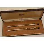 A Cross gold plated pen set, consisting of ball point and propelling pencil,
