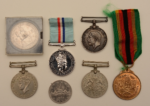 Five war medals, to include Zimbabwe Independence, The Rhodesia Medal,