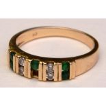 A 14ct gold emerald and diamond ring,