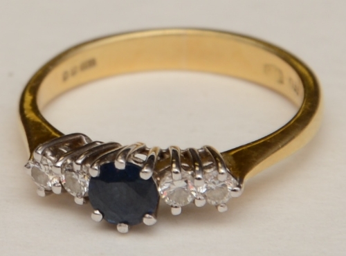 An 18ct gold sapphire and diamond five stone ring,