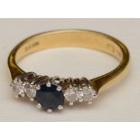 An 18ct gold sapphire and diamond five stone ring,