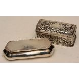 A silver embossed trinket box with cover, hallmarks for London 1890-91, decorated with floral swags,