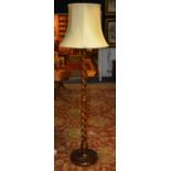 A spiral column floor lamp, with shade,