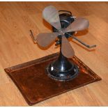 A vintage fan with copper blades, 43cm high, together with a hammered copper tray,