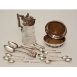 A pair of silver plated wine coasters, with turned wooden bases,