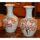 A pair of 20th century large Chinese baluster shaped pottery vases,
