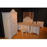 A complete suite of French style cream painted bedroom furniture named 'Amore Range',