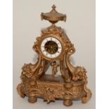 A French gilt mantel clock, with swinging cherub pendulum,