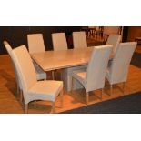 A contemporary marble and composite dining table,