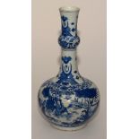 A Chinese blue and white pottery vase, with tall neck, decorated with panels of figures in foliage,