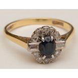 An 18ct gold and platinum sapphire and diamond cluster ring,