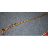 A 19th century musket, probably North African in origin,