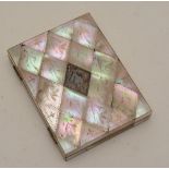 A mother of pearl card case, with silver lozenge mount to the top,