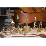 A quantity of brasswares, to include Corinthian style candlesticks, a union burner with shade,
