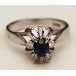 A platinum sapphire and diamond ring,