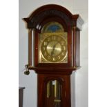 A modern mahogany longcase clock, the celestial dial with Arabic numerals,