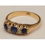 An 18ct gold sapphire and diamond ring,