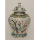 A Chinese famille verte vase, decorated with panels of vases and furniture on white ground,