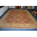 WITHDRAWN - A large carpet of Pakistan origin,