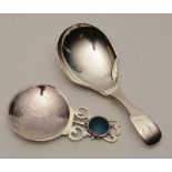 A silver and enamel caddy spoon, hallmarks for Birmingham 2016 by John Shellis,