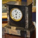 A Victorian black slate and marble mantel clock, the white enamel dial with Roman numerals, 25.