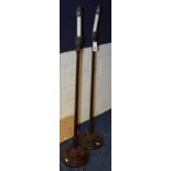 A pair of George III style fluted mahogany floor lamps, in the form of candlesticks,