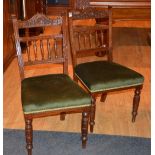 A pair of late Victorian mahogany parlour chairs,