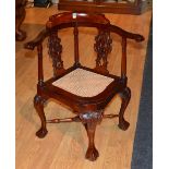 A reproduction Chippendale style corner chair,