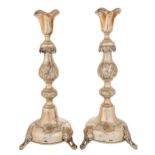 A PAIR OF SILVER REPOUSSE CANDLE STICKS, B. SZKARLAT, WARSAW, CIRCA 1894