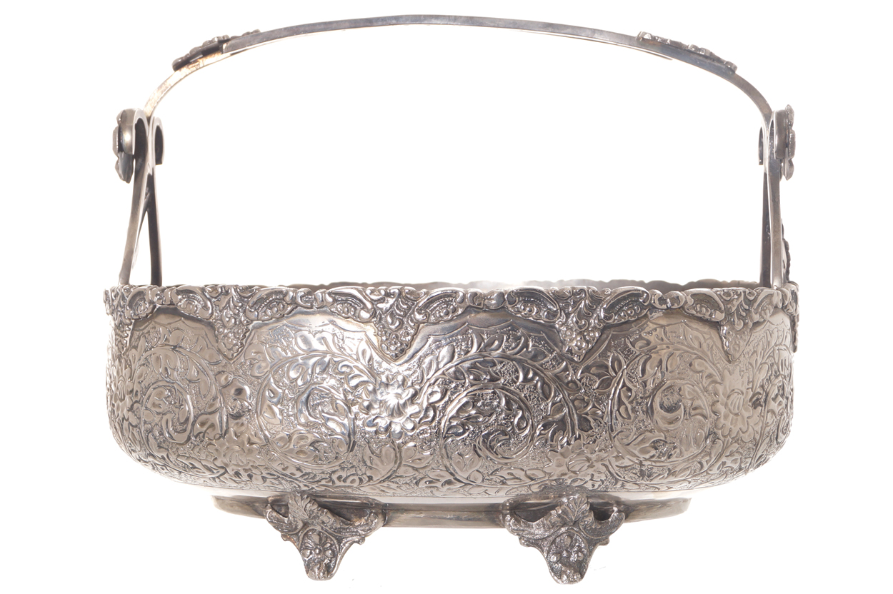 Nineteenth-century Sheffield oval basket with chased and repousse decoration, suspended on a