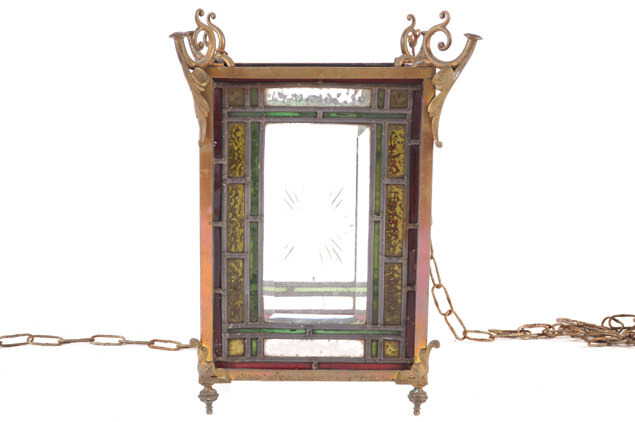 Nineteenth-century brass and leaded glass hall lantern of square form, suspended on chains  40 cm.