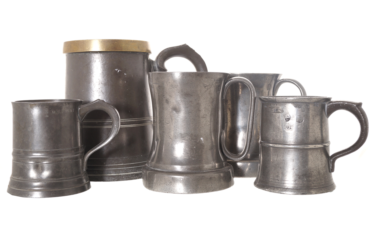 Group of five eighteenth-century Pewter tankards of various sizes  15 cm. high and