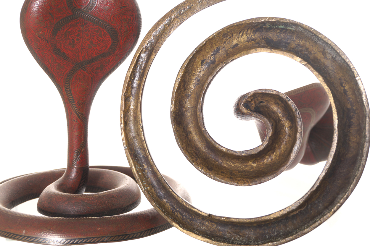 Pair of nineteenth-century Benares brass and enamelled cobra stemmed candle stick holders  24 cm. - Image 7 of 7