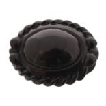 Whitby jet brooch