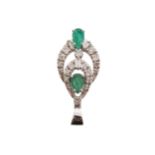 18 ct. white gold, emerald and diamond pendant