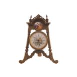 Small late nineteenth-century French brass and porcelain desk clock