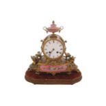 Nineteenth-century French ormolu and porcelain inset mantle clock