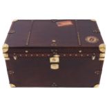 Large brass mounted leather bound travelling trunk